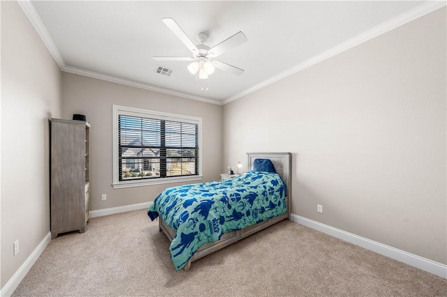 bedroom with light carpet, ceiling fan, and crown molding