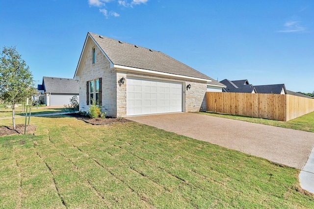 view of home's exterior with a yard and a garage