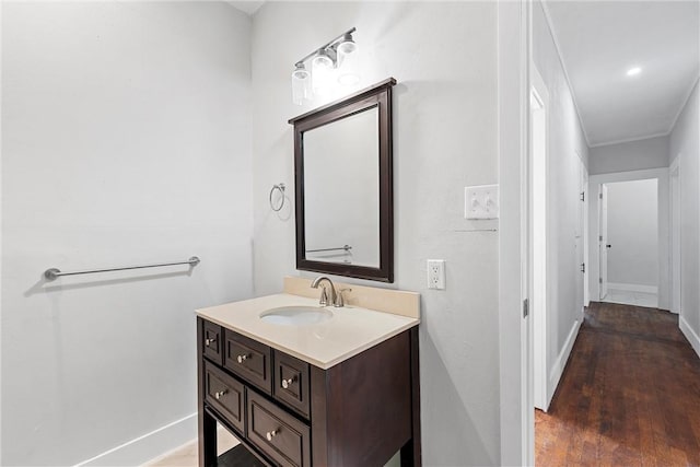 bathroom with wood-type flooring and vanity