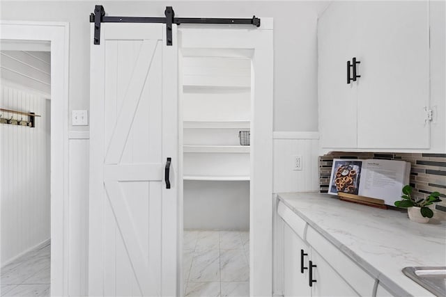 interior space featuring backsplash