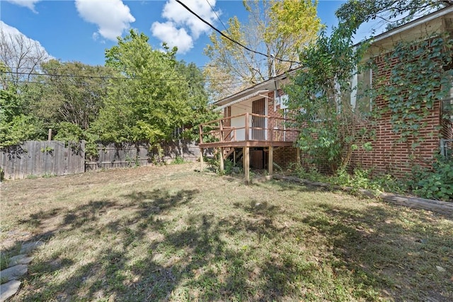 view of yard with a deck