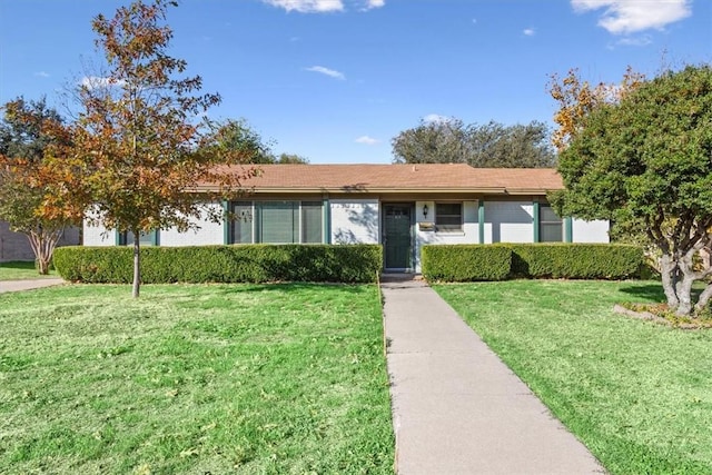 ranch-style house with a front yard