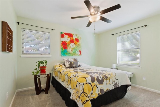 bedroom featuring ceiling fan and carpet floors