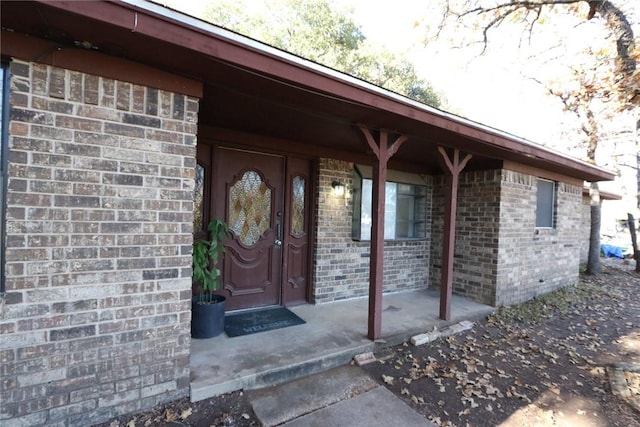 property entrance with a porch