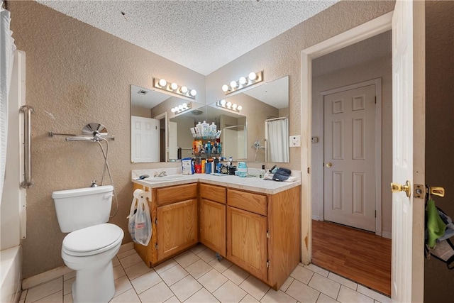 full bathroom with tile patterned floors, vaulted ceiling, a shower with curtain, and a textured wall