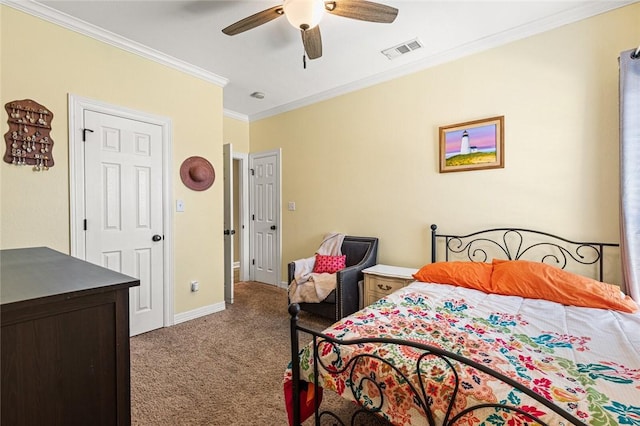 bedroom featuring baseboards, visible vents, ceiling fan, ornamental molding, and carpet flooring