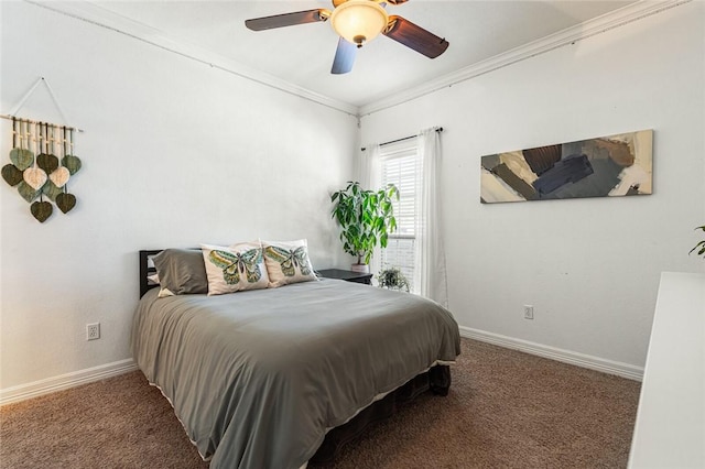 carpeted bedroom with crown molding, baseboards, and ceiling fan