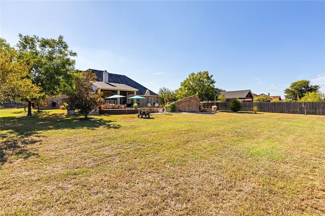 view of yard with fence