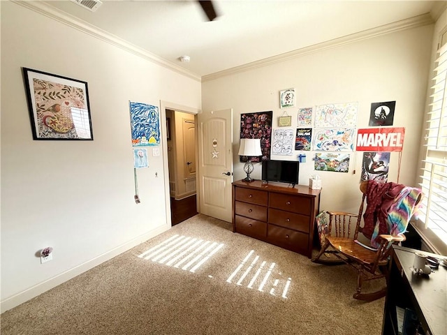 bedroom with ornamental molding and carpet flooring