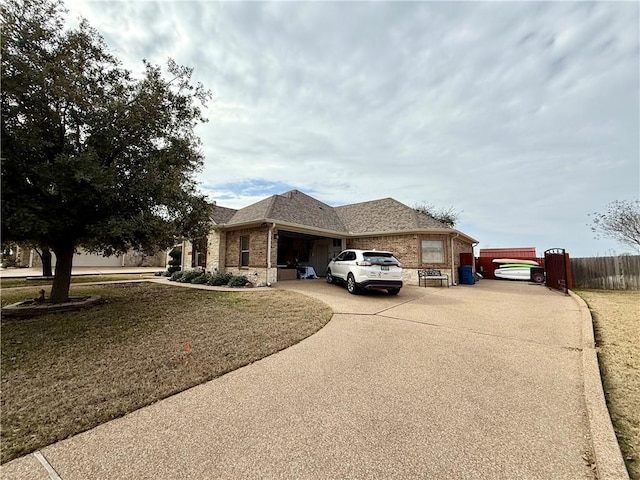 ranch-style house with a front yard