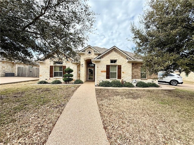 view of front of property with a front lawn