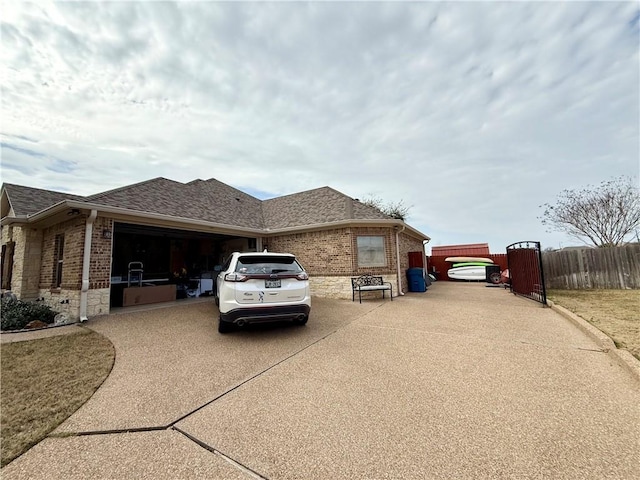 view of side of property with a garage