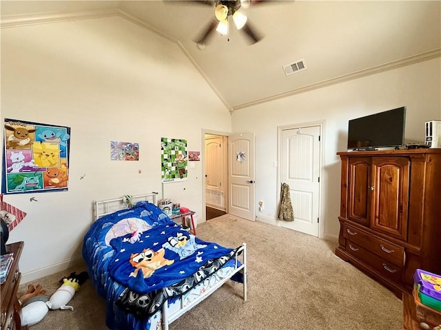 carpeted bedroom featuring vaulted ceiling, ceiling fan, and crown molding