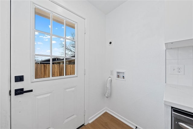 doorway to outside with hardwood / wood-style flooring