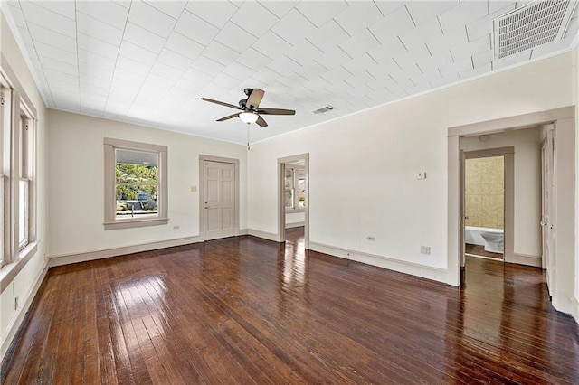 unfurnished room featuring dark hardwood / wood-style flooring, ceiling fan, and ornamental molding