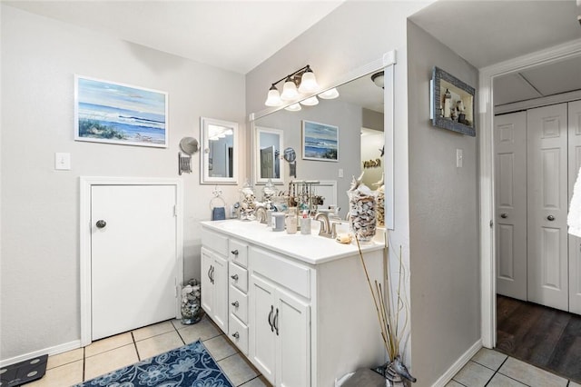 bathroom featuring tile patterned floors and vanity