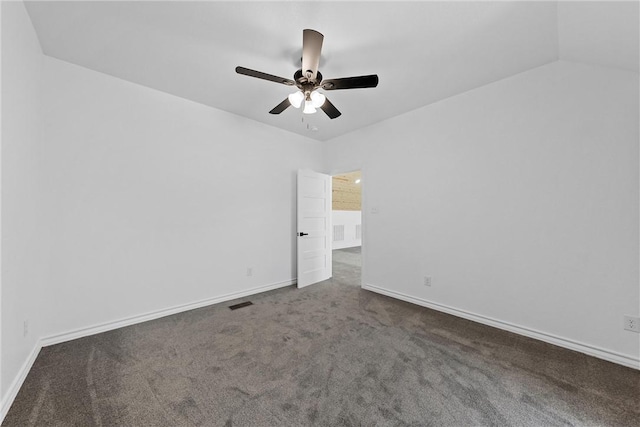 unfurnished room featuring visible vents, baseboards, carpet, and ceiling fan