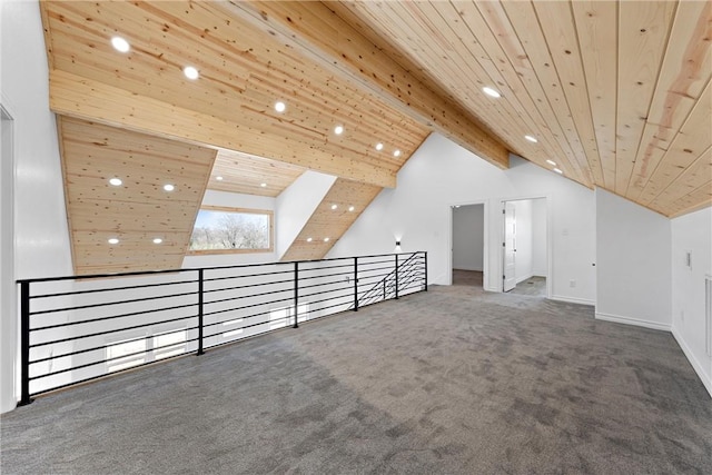 additional living space featuring beamed ceiling, wood ceiling, carpet, and high vaulted ceiling