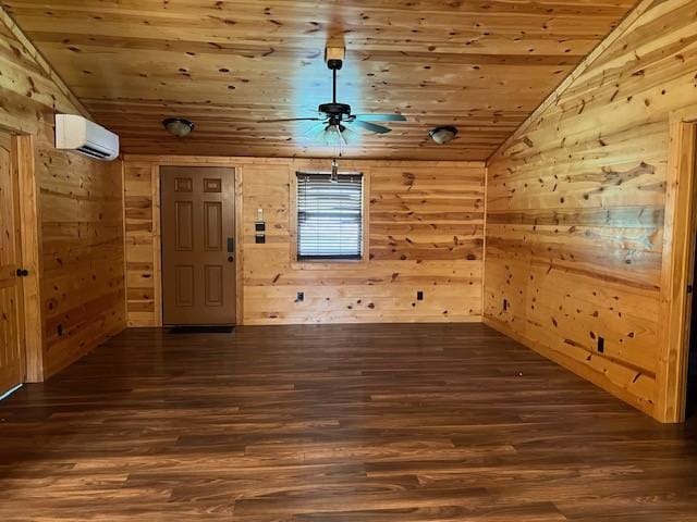 bonus room featuring dark wood-type flooring, a wall unit AC, vaulted ceiling, wooden walls, and wood ceiling