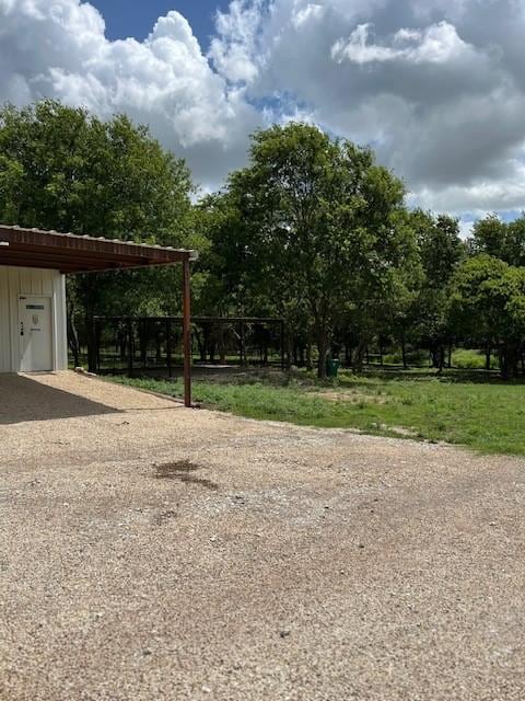 view of yard with a carport