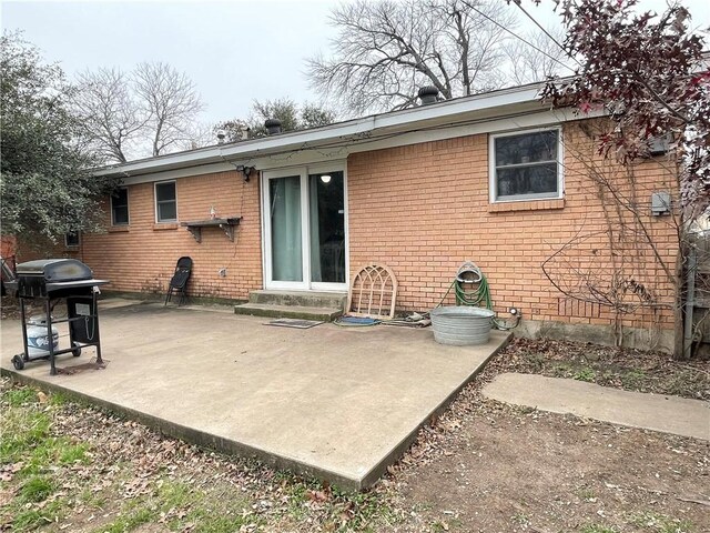 back of house featuring a patio area