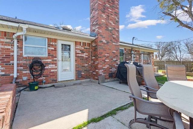 view of patio / terrace with fence