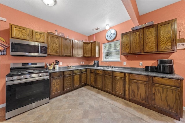 kitchen featuring sink and stainless steel appliances