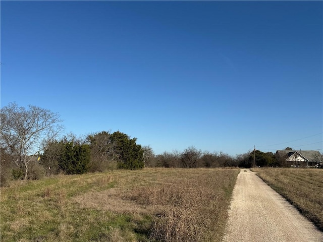 view of street featuring a rural view