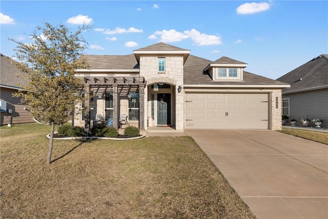 view of front of property with a garage and a front lawn