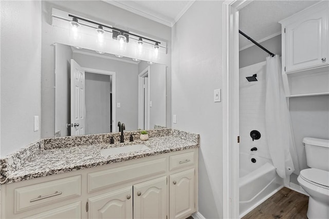 full bathroom featuring shower / tub combo, ornamental molding, vanity, wood-type flooring, and toilet