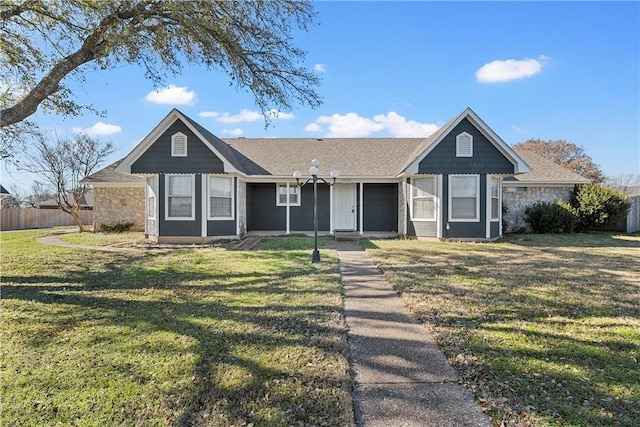 ranch-style home with a front yard