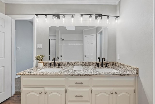 bathroom featuring vanity and hardwood / wood-style flooring