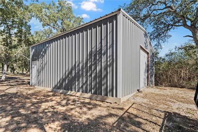 view of outdoor structure featuring a garage