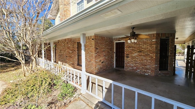 view of patio featuring ceiling fan