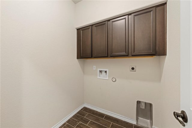 laundry area with hookup for an electric dryer, hookup for a gas dryer, cabinets, and washer hookup