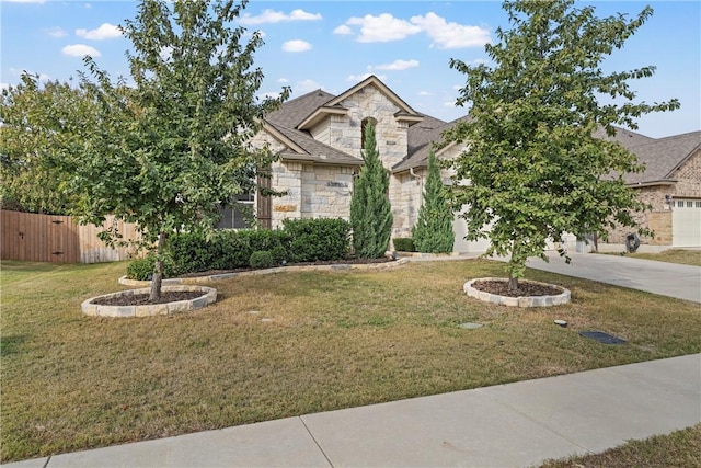 view of front of home with a front yard