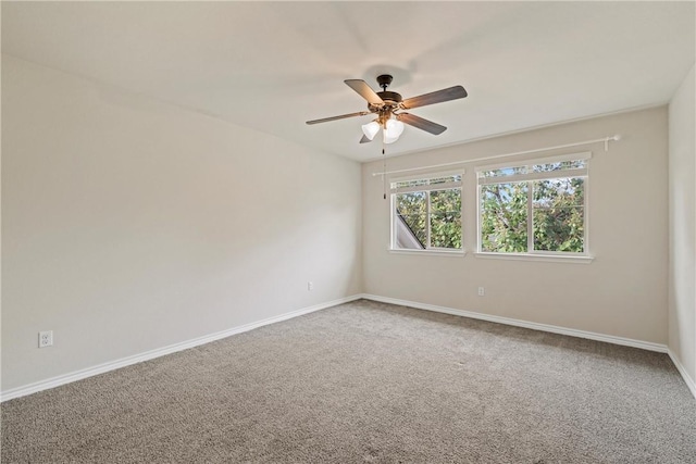 empty room with carpet and ceiling fan