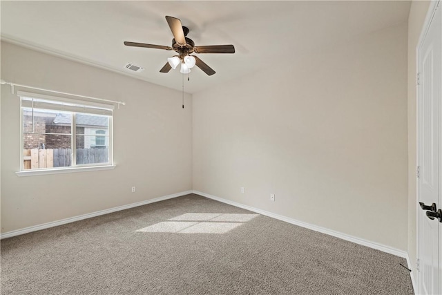 carpeted empty room with ceiling fan