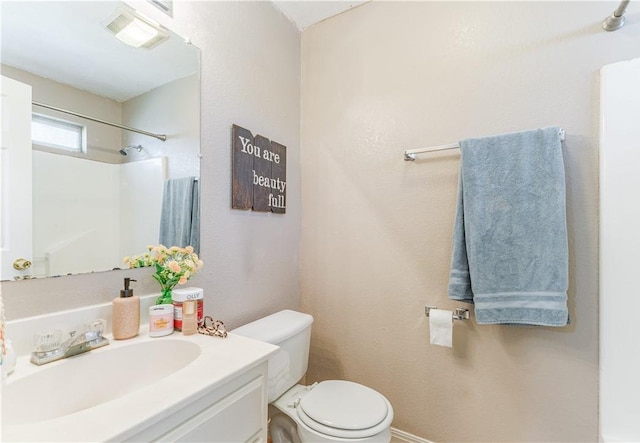 full bathroom with a shower, visible vents, vanity, and toilet