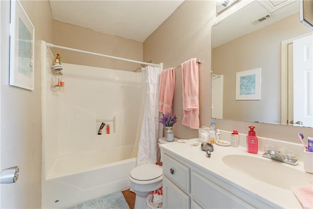 bathroom with toilet, visible vents, shower / bath combo with shower curtain, and vanity