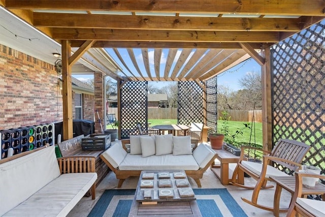 view of patio / terrace with fence, a pergola, and an outdoor hangout area