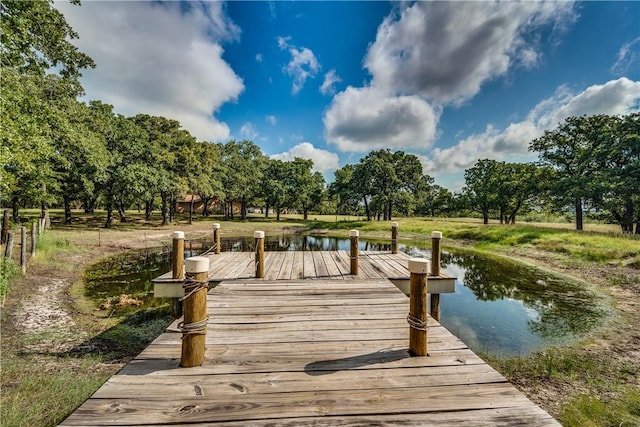 view of dock with a water view