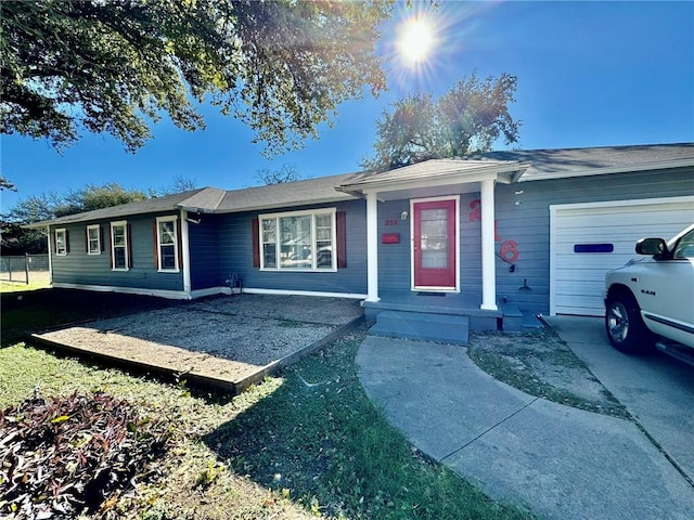 single story home with a garage