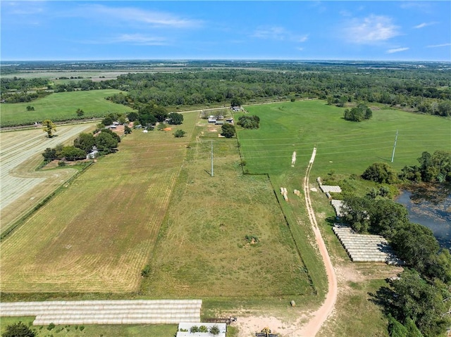 birds eye view of property featuring a rural view