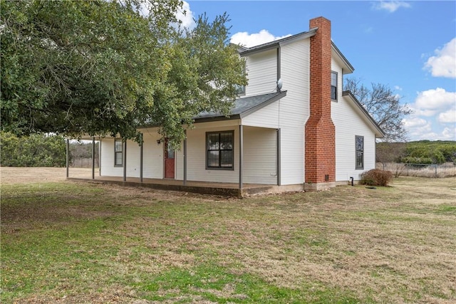 exterior space featuring a front lawn