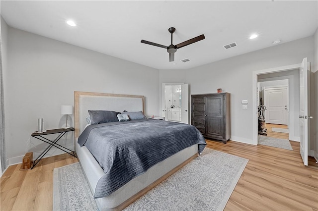 bedroom featuring ceiling fan and light wood-type flooring