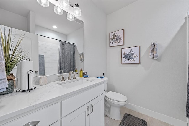 bathroom featuring a shower with shower curtain, wood-type flooring, vanity, and toilet