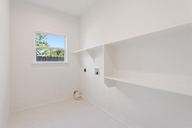 laundry area with hookup for an electric dryer and washer hookup