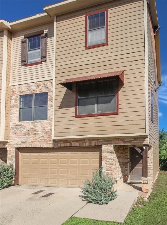 view of front of home featuring a garage