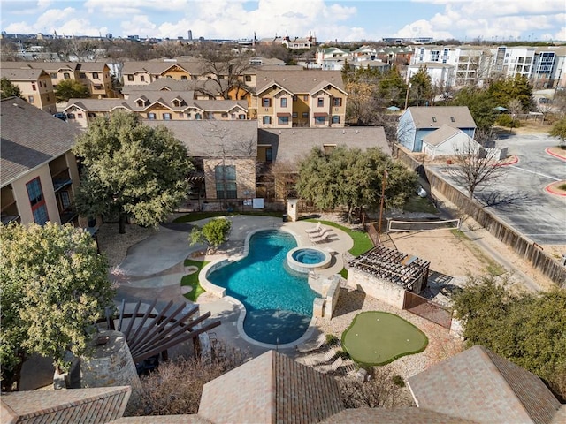 view of swimming pool with a patio